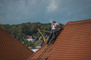 man in the roof